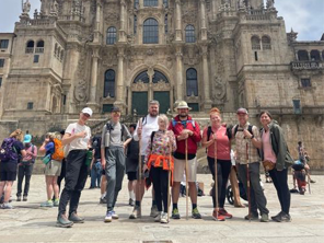 the team in front of a cathedral in Spain