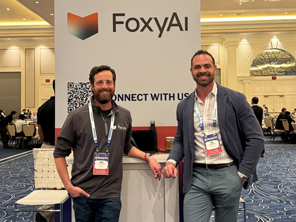 dan and vin at a conference